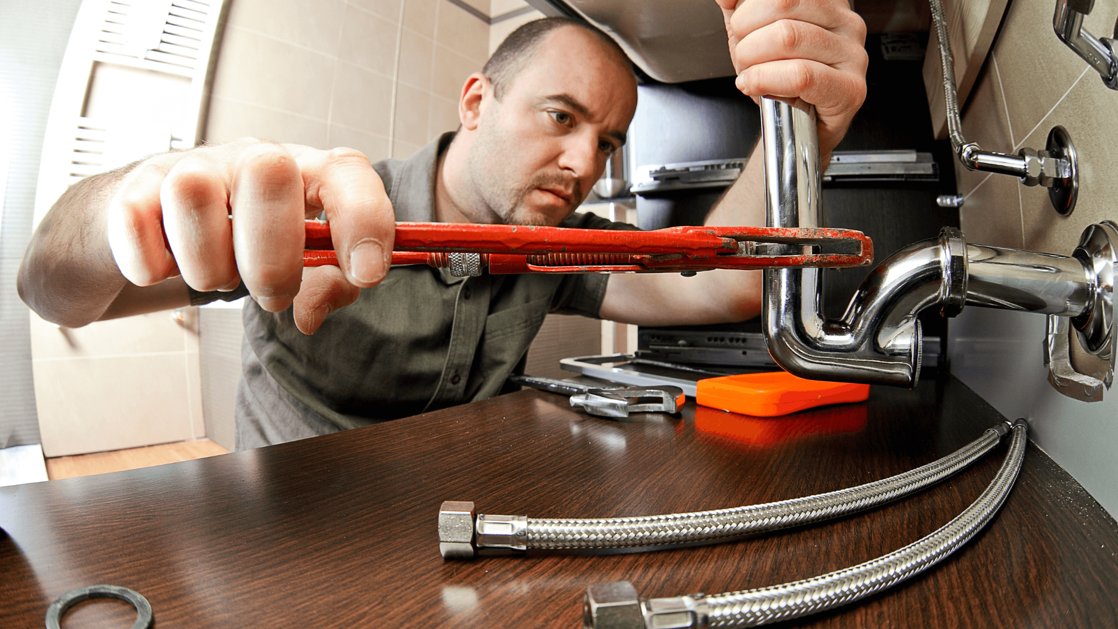 plumber under sink