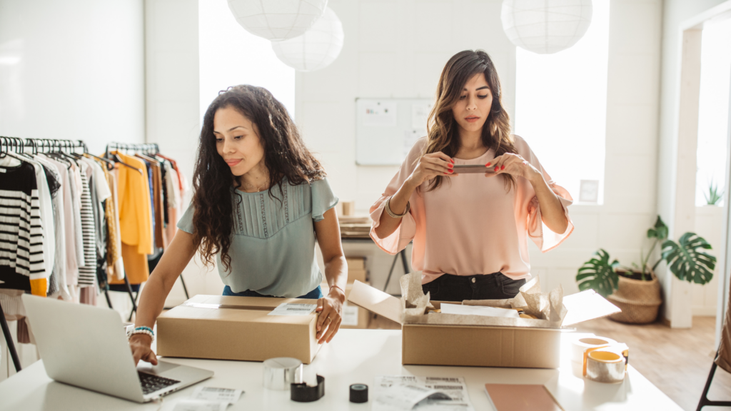 business owners packing parcels