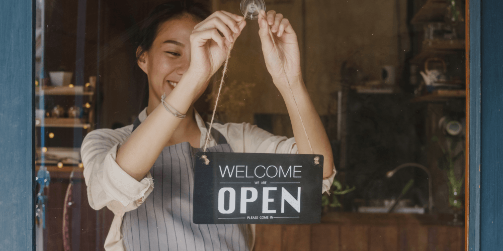 small business owner opening up the shop