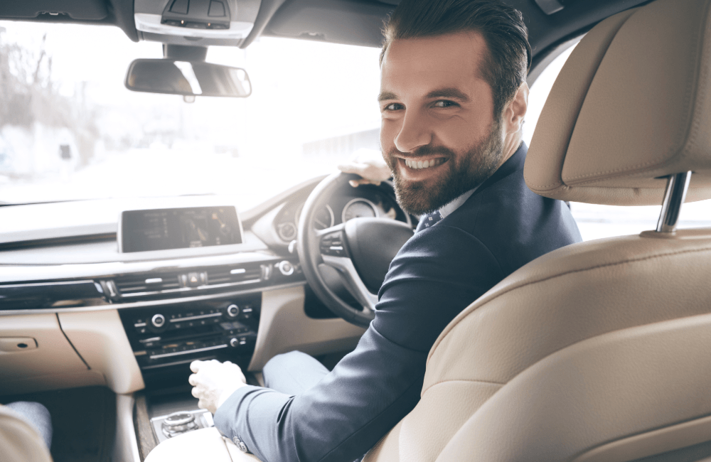 sole trader in his car